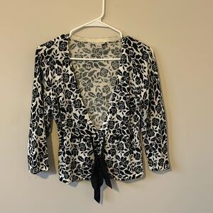 White and black floral print sweater from White House Black Marker in size 4.